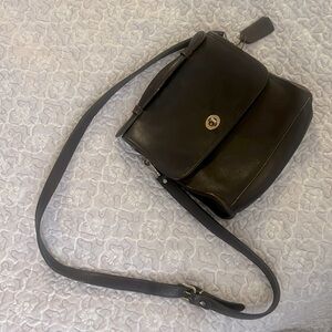 Brown leather handbag.